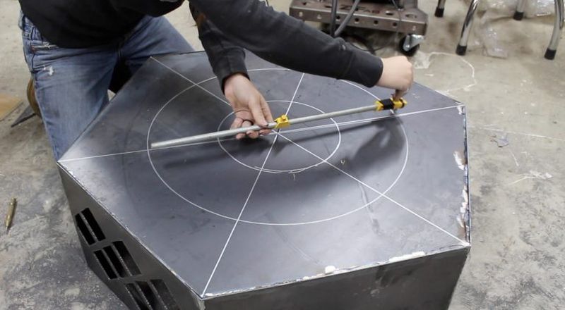 Drawing even-spaced drain holes in the fire pit