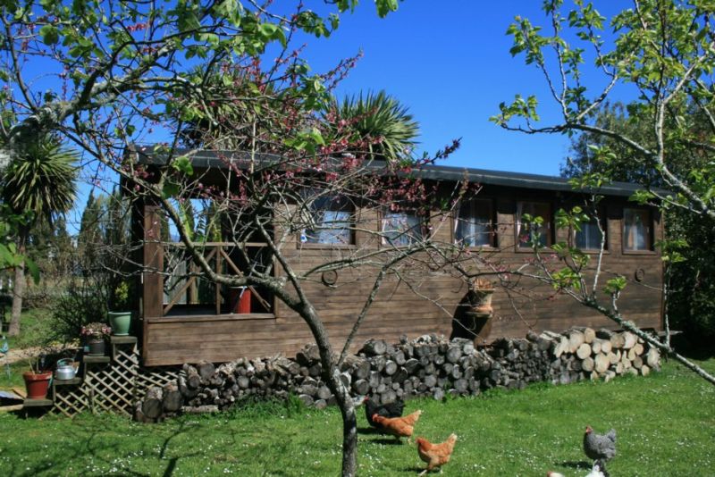 Cozy wooden cabin with a private garden