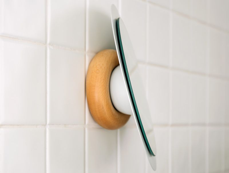 Toro rotating wall mirror by Gravina