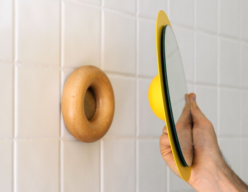 Toro rotating wall mirror by Gravina