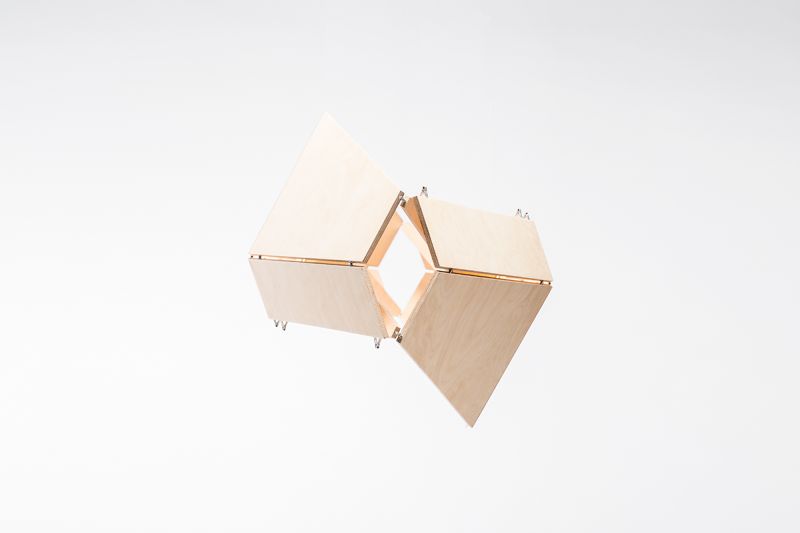 Uniquely-shaped wood light fixture