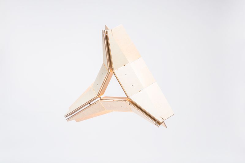 Another view of the sculptural wood lighting