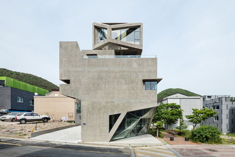 Moon Hoon builds angled concrete house in shape of an owl