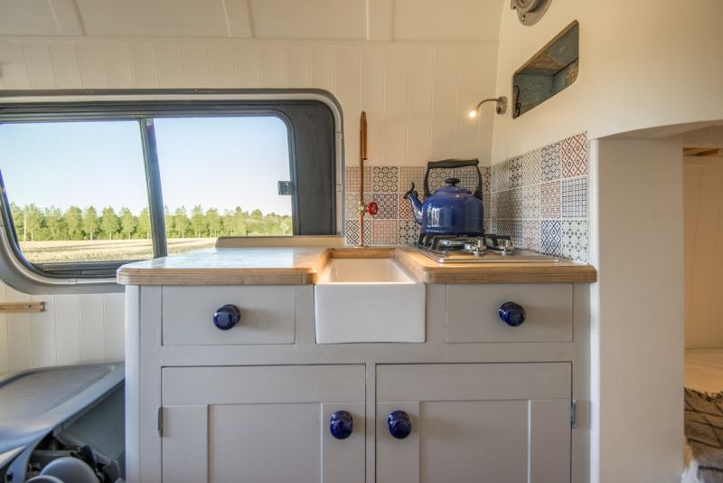 This camper van conversion accommodates a family of four