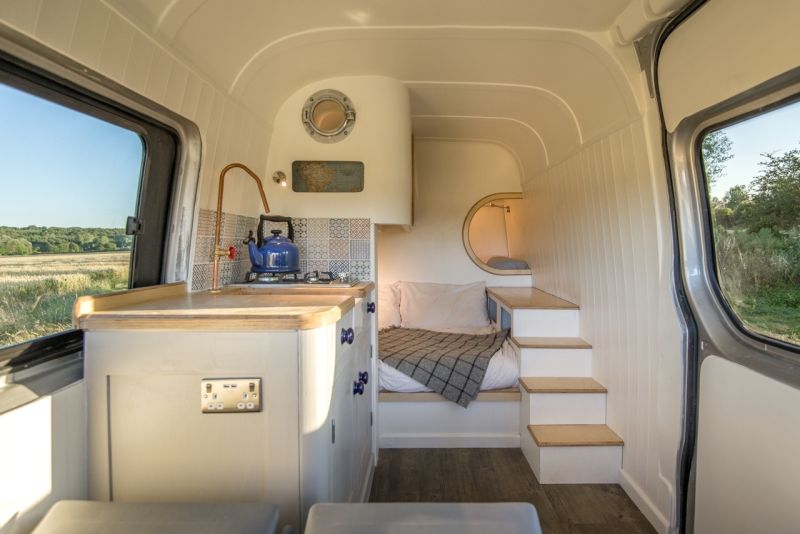 This camper van conversion accommodates a family of four