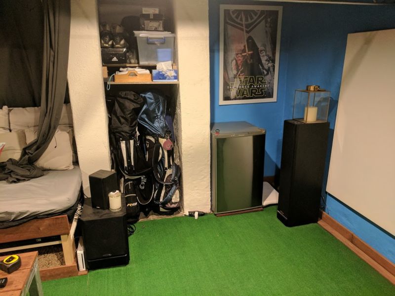 This couple builds a secret staircase to the basement home theater