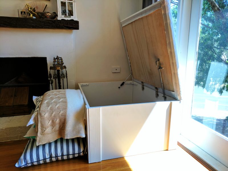 This couple builds a secret staircase to the basement home theater