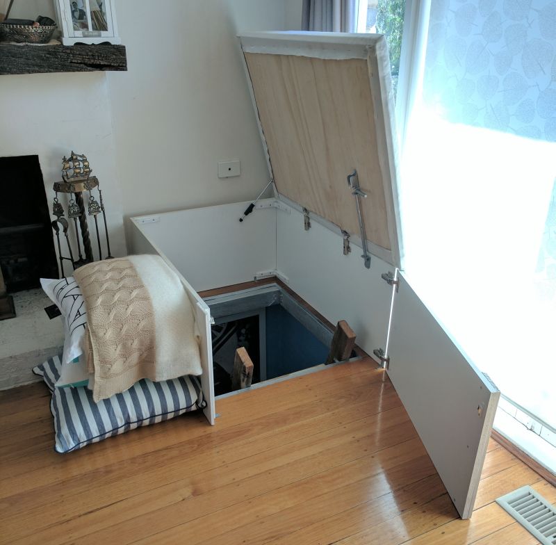 This couple builds a secret staircase to the basement home theater