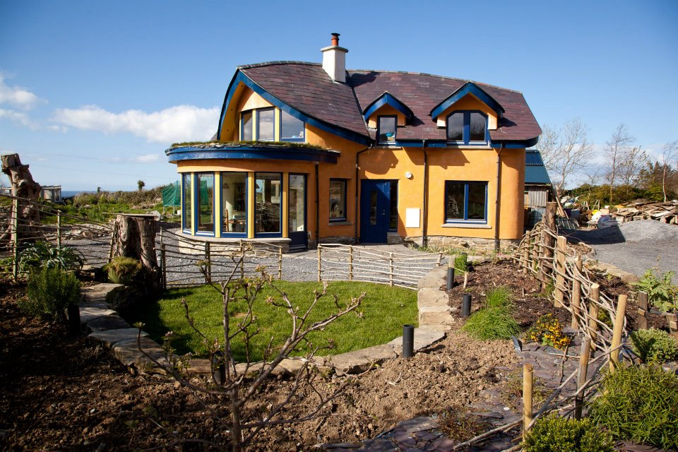 This Cob  house is as beautiful  as its making