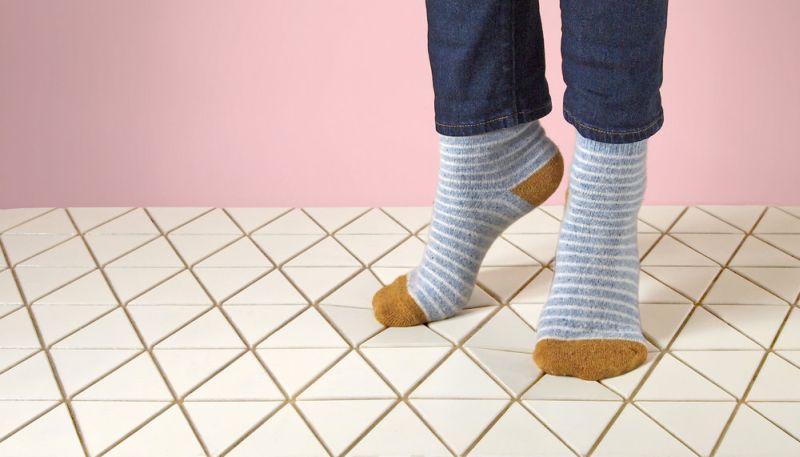 Airea wood block floor mat by Sitskie calms your legs