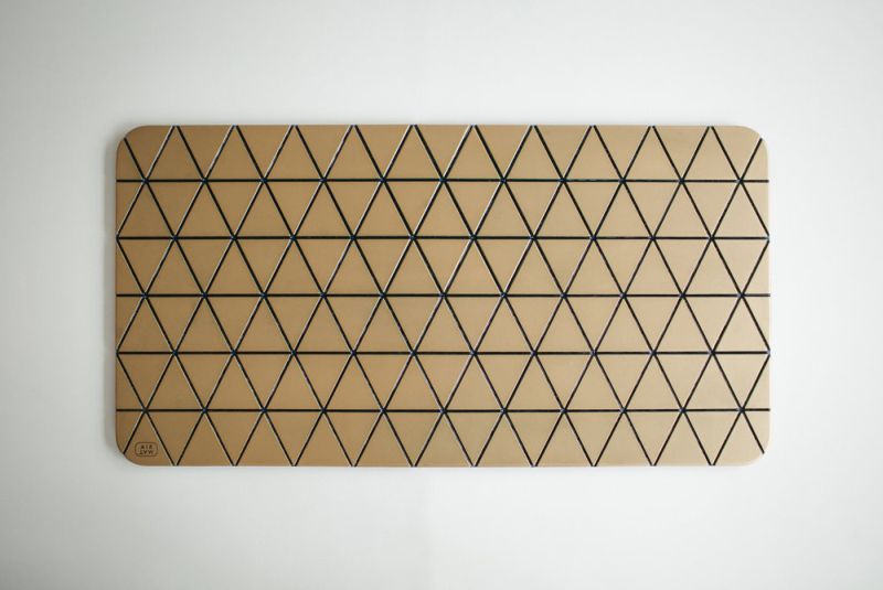 Airea wood block floor mat by Sitskie calms your legs