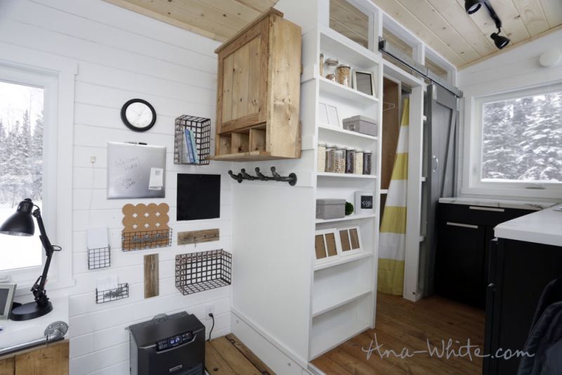 Ana White’s open concept tiny house features elevator bed to save space