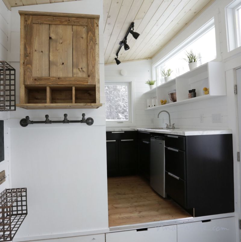 Ana White’s open concept tiny house features elevator bed to save space