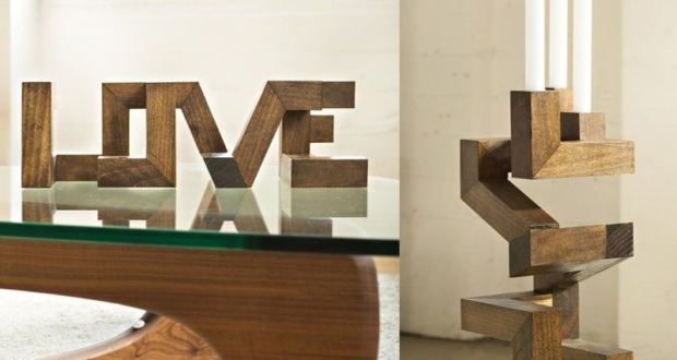 Love Interactive sculpture works as both a candle holder and a vase