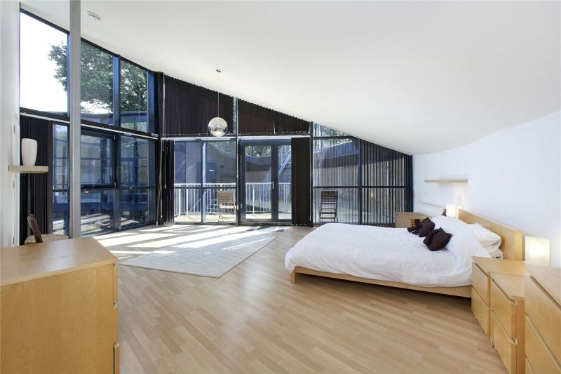 Old water reservoir transformed into an underground family home