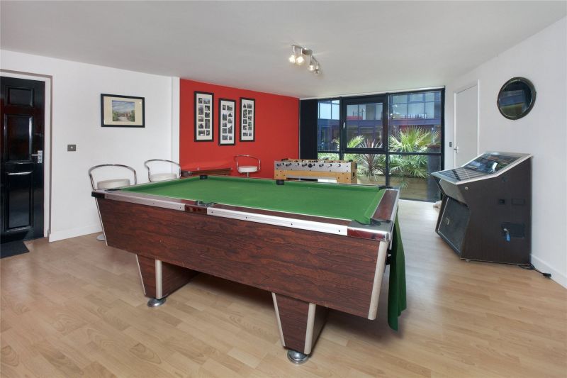 Old water reservoir transformed into an underground family home