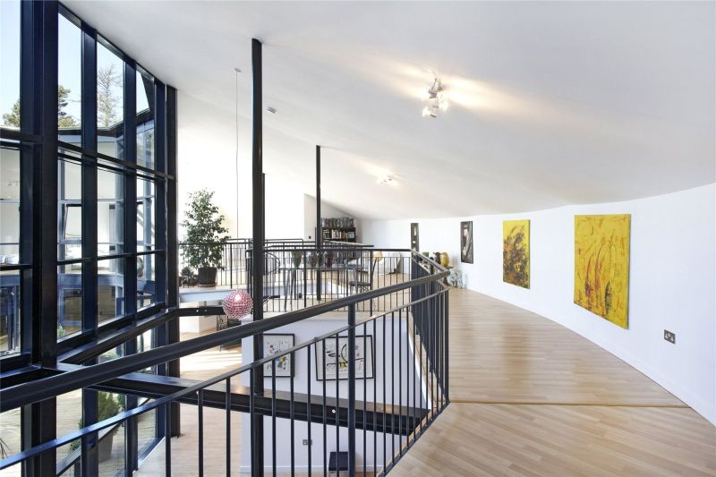 Old water reservoir transformed into an underground family home