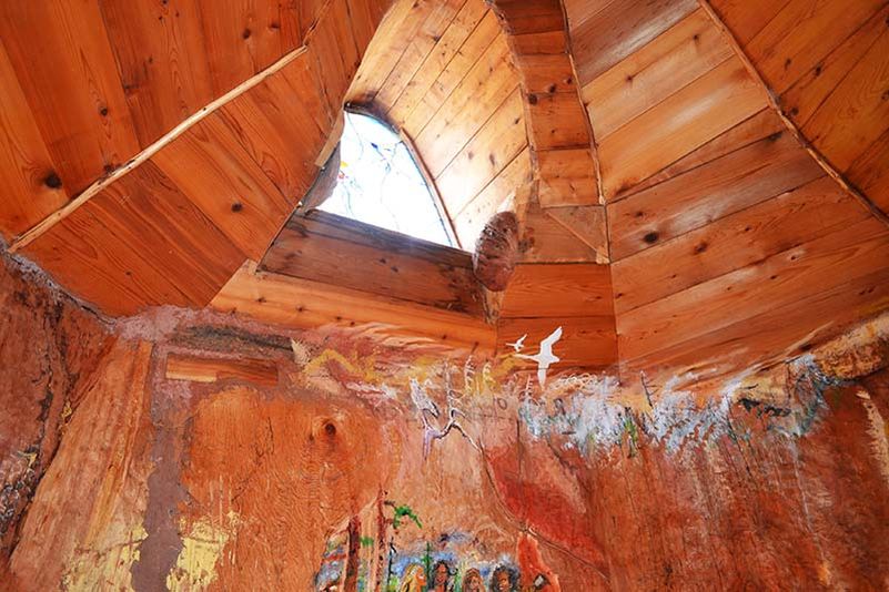 Real-life hobbit house built out of a single tree trunk