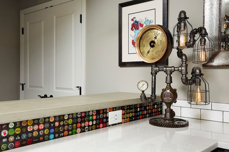 This remodeled basement features home theater and a steampunk bar