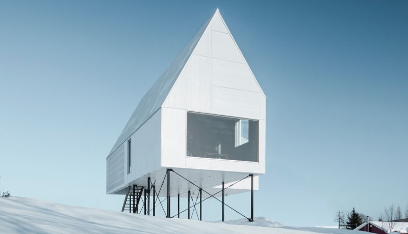 All-white High House by Delordinaire blends well with snowy slopes