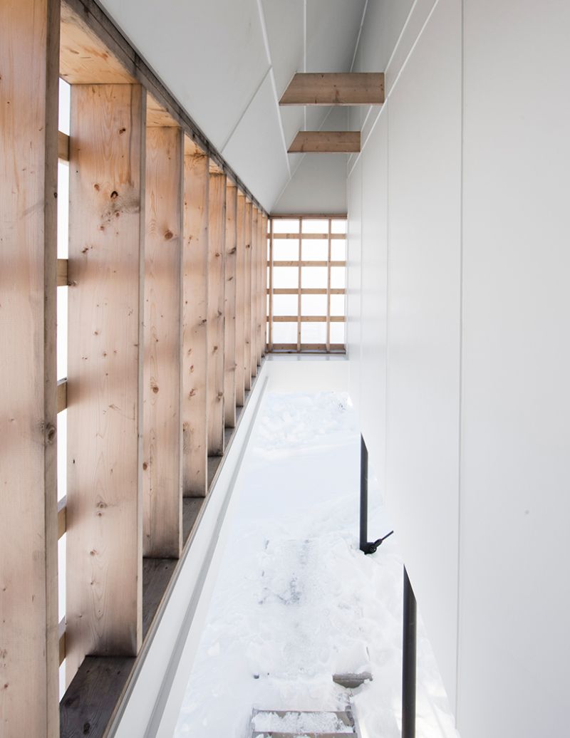 All-white High House by Delordinaire blends well with snowy slopes