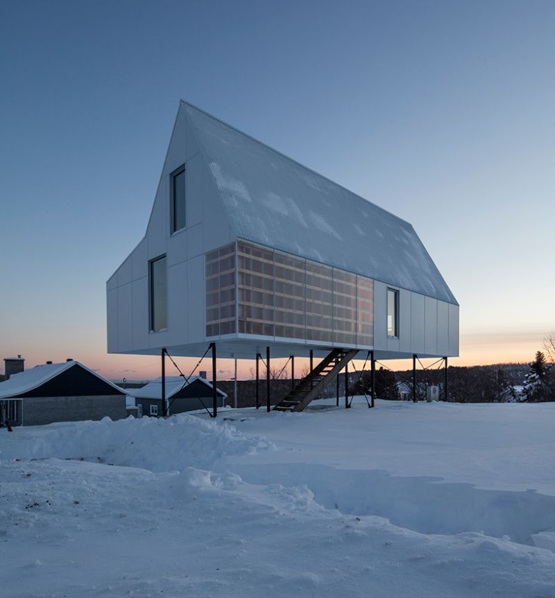 All-white High House by Delordinaire blends well with snowy slopes