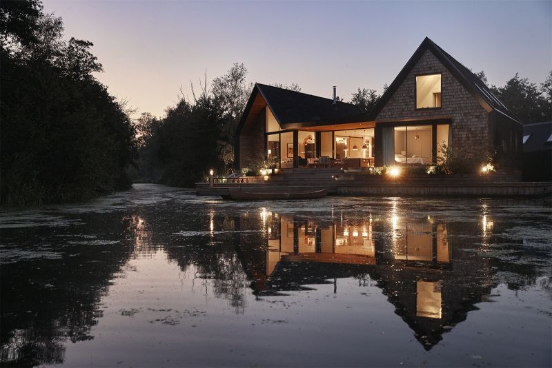 Backwater is a waterside house located across a private lagoon