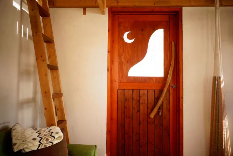 Daigo designs tiny off-grid cabin in Japanese woods