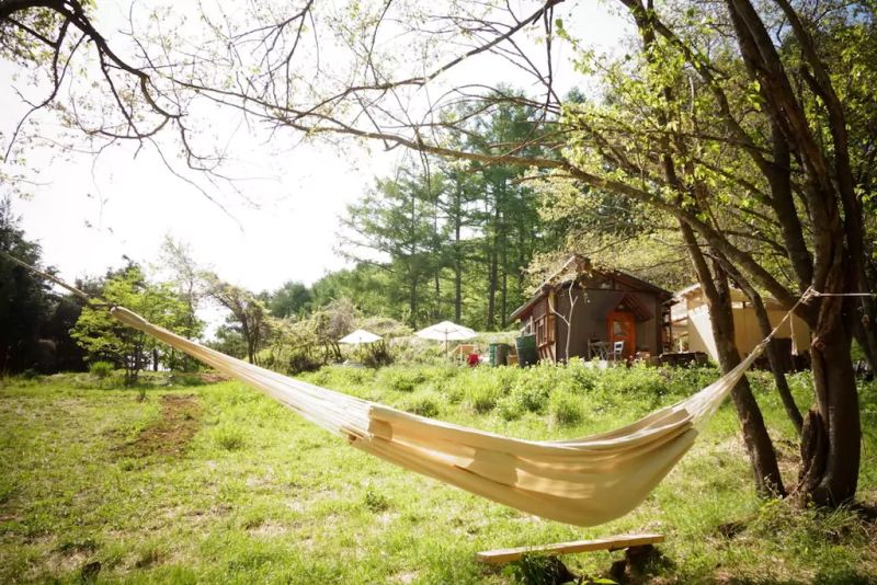 Daigo designs tiny off-grid cabin in Japanese woods