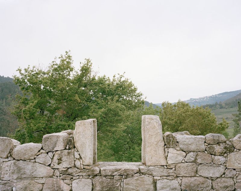 Old stone house in ruins transformed into modern vacation home