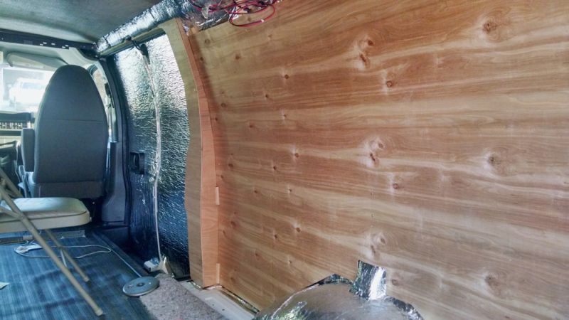 Ross Lukeman transforms cargo van into cozy home with office