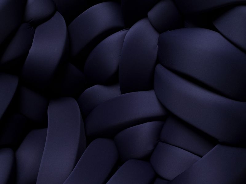 Lawless Chair by Evan Fay consists of foam ribbons interwoven in metal frame