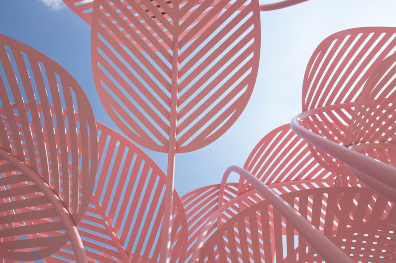 Le Refuge daybeds by Marc Ange come with overhead metal leaves