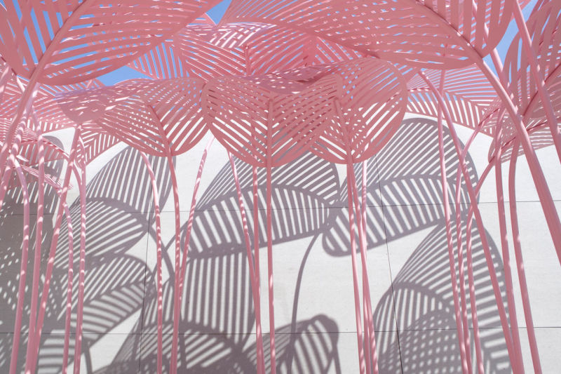 Le Refuge daybeds by Marc Ange come with overhead metal leaves