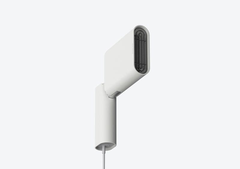 Squared hairdryer by JiyounKim Studio comes with translucent cord keeper