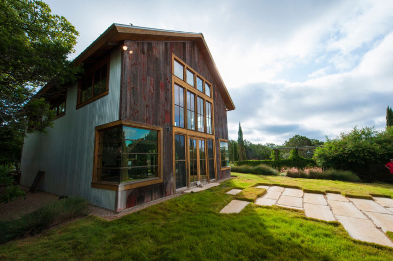 Stair with slide turns restored barn into playground