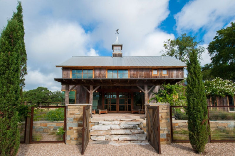 Stair with slide turns restored barn into playground