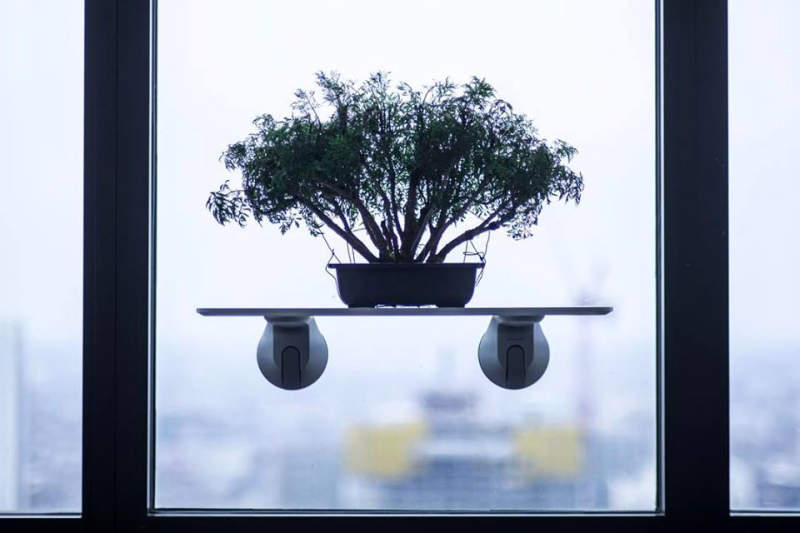 Deskview is a window-mounted adjustable standing desk