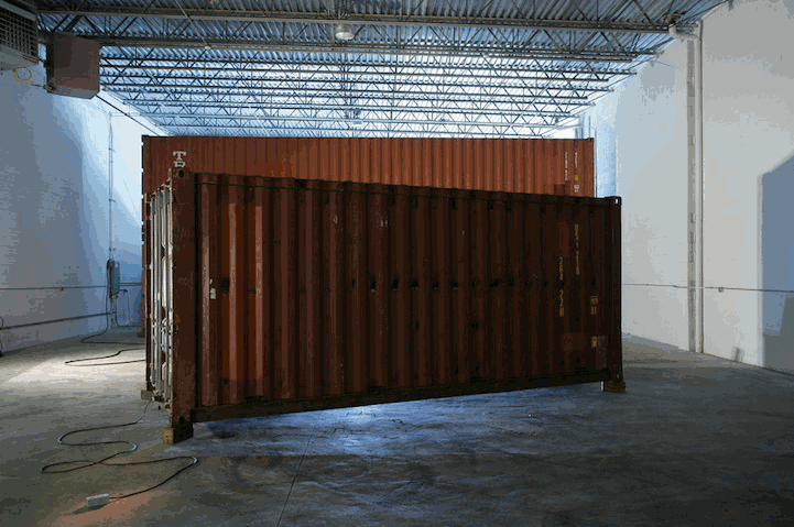 Shipping Crate Transformed into a Push Button Home