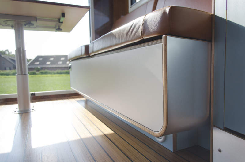 Tonke Woodline truck camper features hydraulic system to detach living unit from truck bed