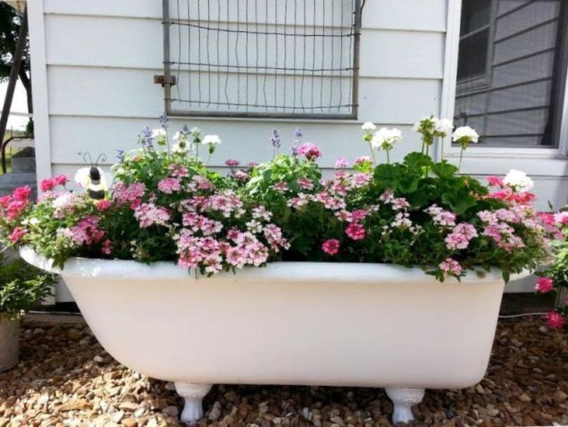 Old Bathtub into garden planter 
