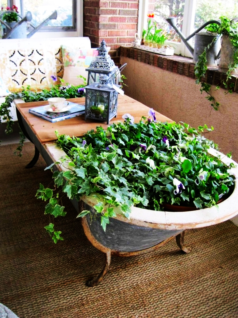 Old bathtub into garden planter