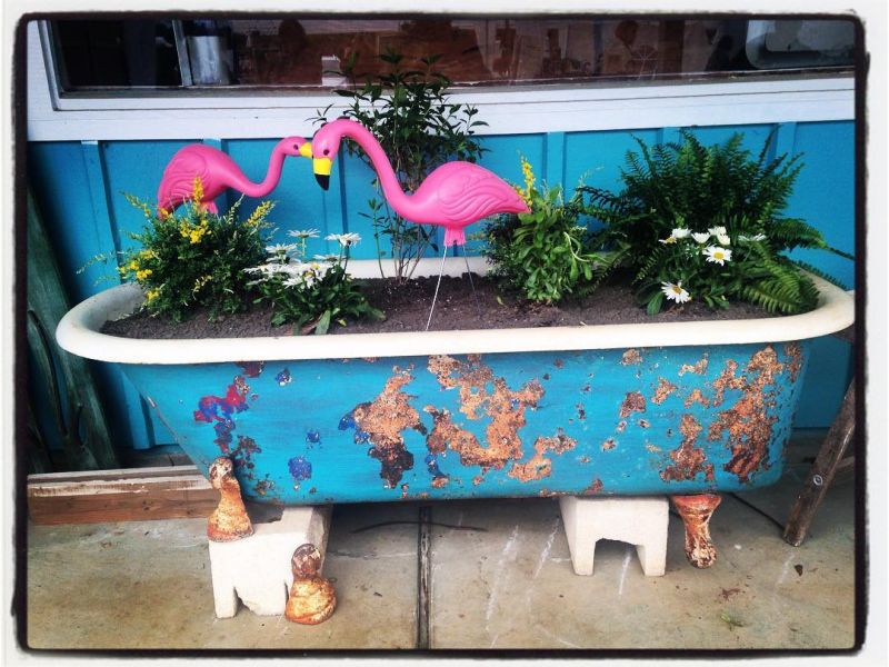 Old bathtub into garden planter