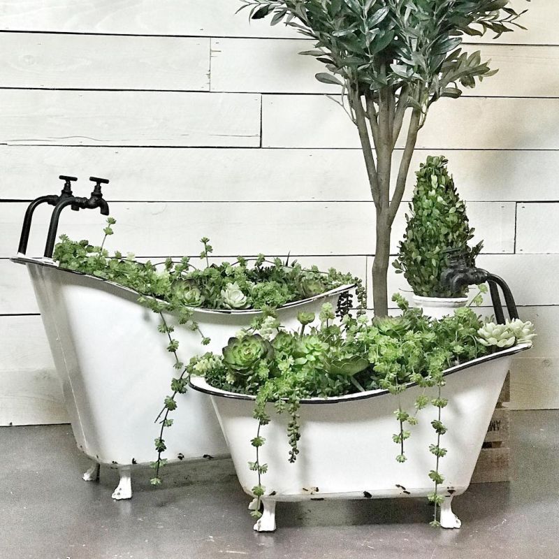 Old bathtub into garden planter