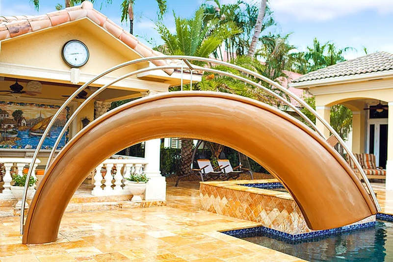 SplinterWorks’ sculptural pool slides bring unlimited fun to your home
