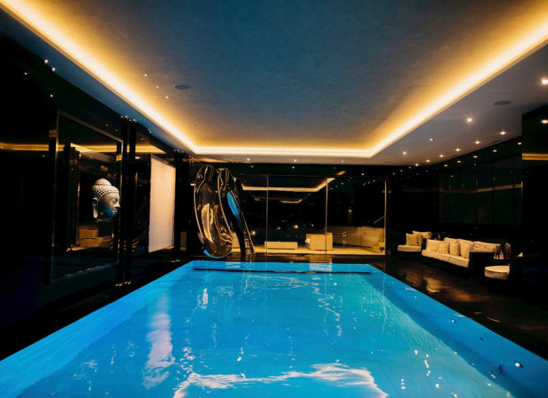 SplinterWorks’ sculptural pool slides bring unlimited fun to your home