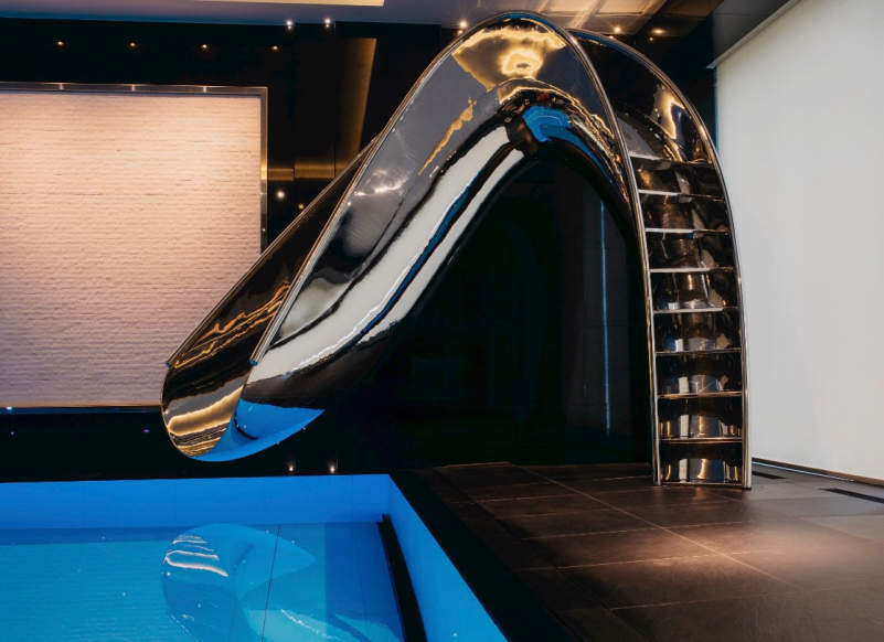 SplinterWorks’ sculptural pool slides bring unlimited fun to your home