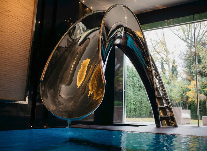 SplinterWorks’ sculptural pool slides bring unlimited fun to your home