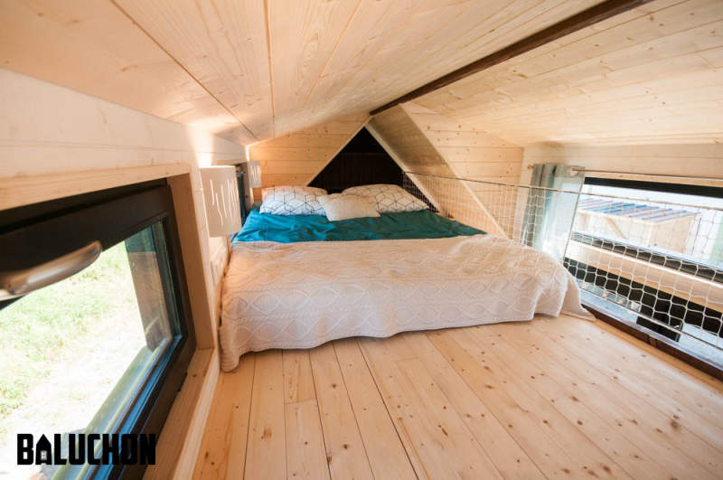 Ostara tiny house by Baluchon features two-leaf glass door