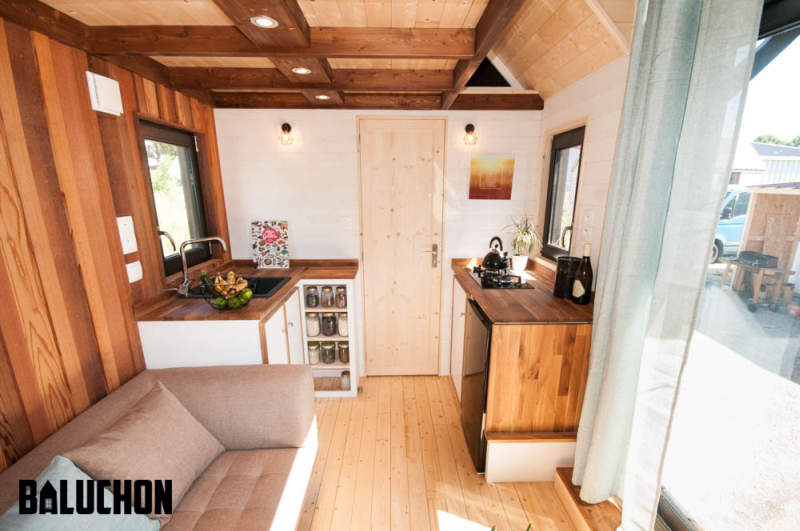 Ostara tiny house by Baluchon features two-leaf glass door